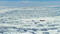 A U.S. Air Force B-1B Lancer and a 909th Aerial Refueling Squadron KC-135 Stratotanker, assigned to Kadena Air Base, Japan, conduct aerial refueling operations during a Bomber Task Force mission, Nov. 13, 2020, over the Pacific Ocean. Bomber Task Force deployments demonstrate U.S. commitment to allies and partners and they train regularly with other units throughout the theater in order to maintain a free and open Indo-Pacific. (U.S. Air Force courtesy photo by 909th Aerial Refueling Squadron)