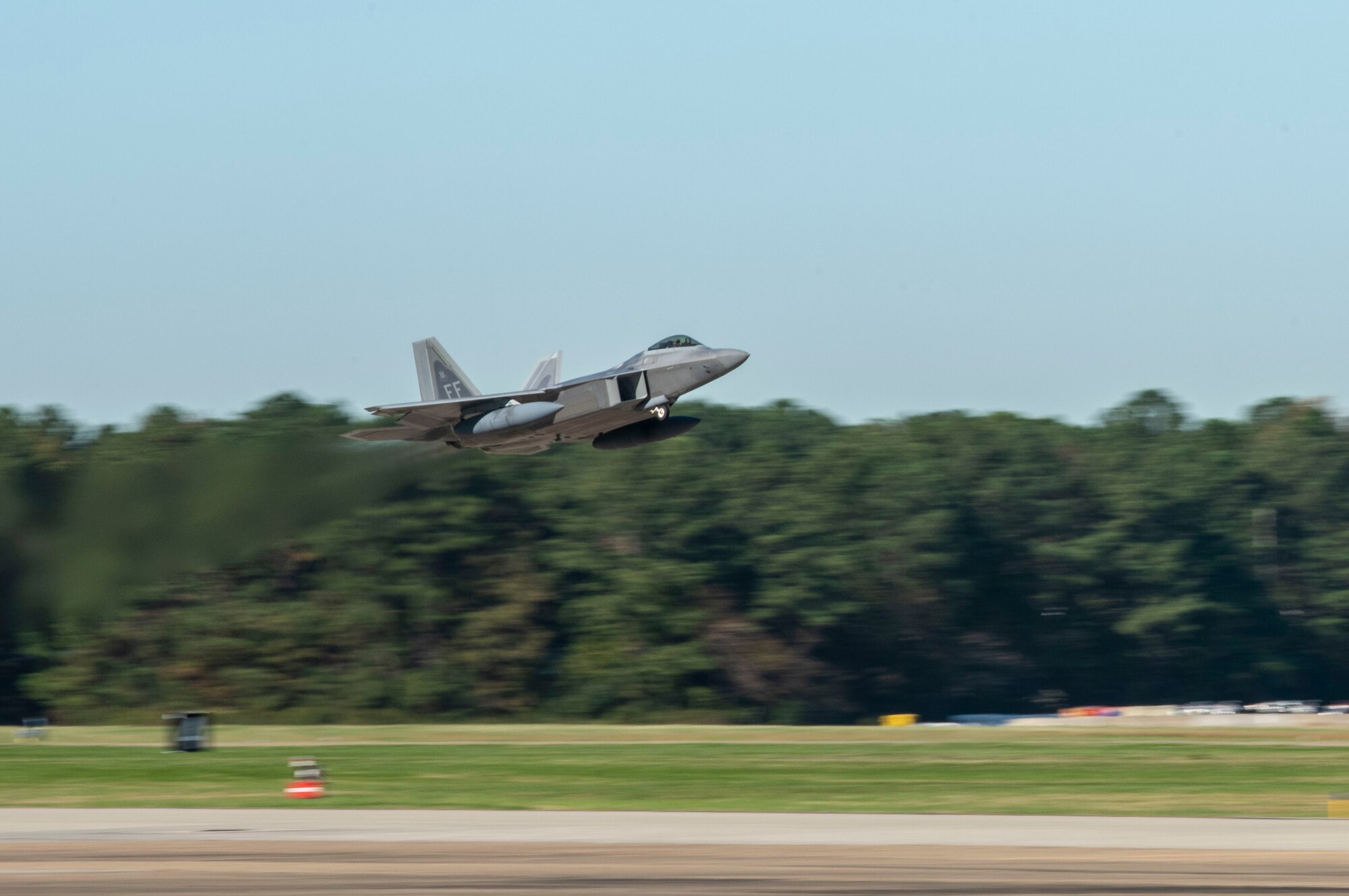 A U.S. Air Force F-22 Raptor aircraft assigned to the 1st Fighter Wing, takes flight.