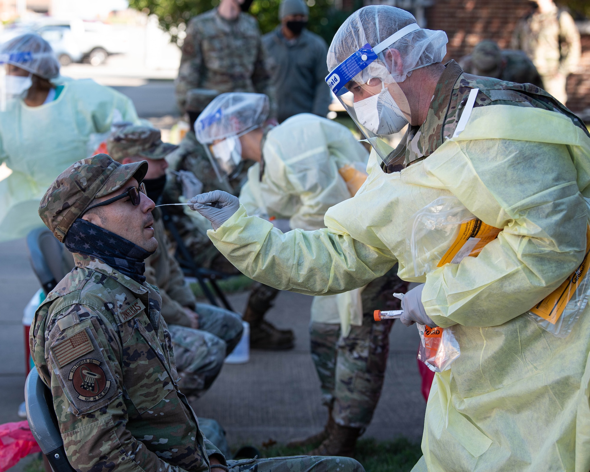 A member of the 1st Fighter Wing receives a COVID test before out processing.