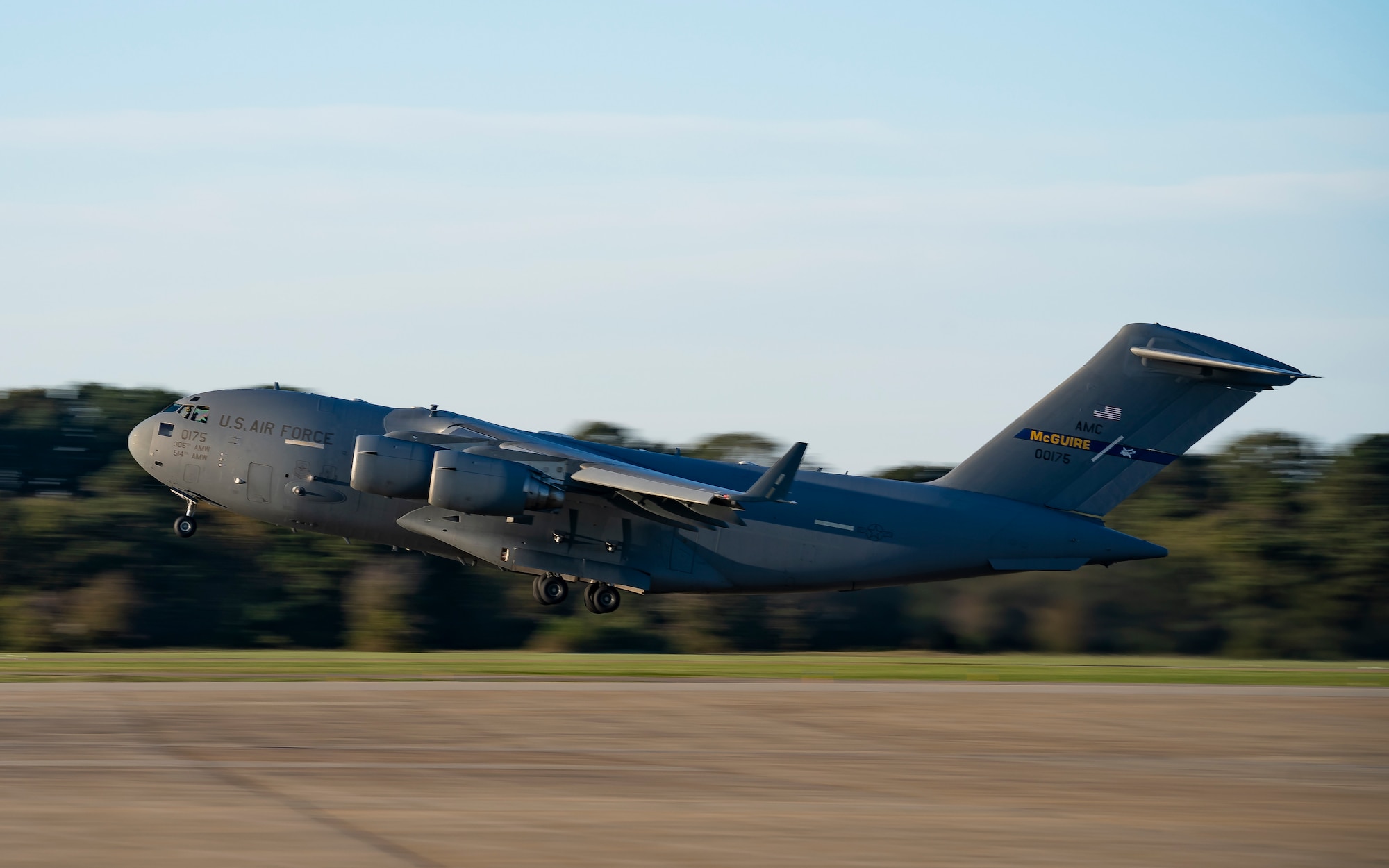 A U.S. Air Force C-17 Globemaster III aircraft assigned to Joint Base McGuire-Dix-Lakehurst takes flight.