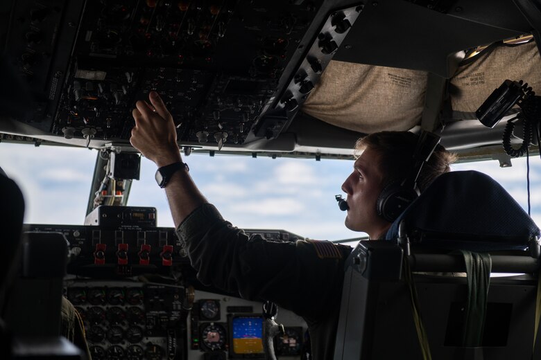 U.S. Air Force Capt. Dan Thomas, 909th Aerial Refueling Squadron KC-135 Stratotanker pilot, conducts aerial refueling operations in support of a Bomber Task Force mission, Nov. 13, 2020, over the Pacific Ocean off the coast of Japan. Bomber Task Force missions demonstrate U.S. commitment to allies and partners throughout the Indo-Pacific area of responsibility and the ability of Air Force Global Strike Command to deliver lethal strike options for combatant commanders at a moment's notice. (U.S. Air Force photo by Staff Sgt. Peter Reft)
