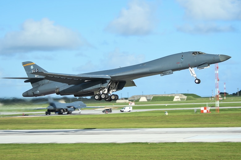 Aircrew with the 9th Expeditionary Bomb Squadron raise the landing gear of a U.S. Air Force B-1B Lancer during take-off in a joint interoperability exercise at Andersen Air Force Base, Guam, Nov. 13, 2020. Participating in the exercise allowed B-1 aircrews to obtain training that could be imperative in the future missions as they continue to stay committed to the security and stability of the Indo-Pacific region. (U.S. Air Force photo by Staff Sgt. David Owsianka)