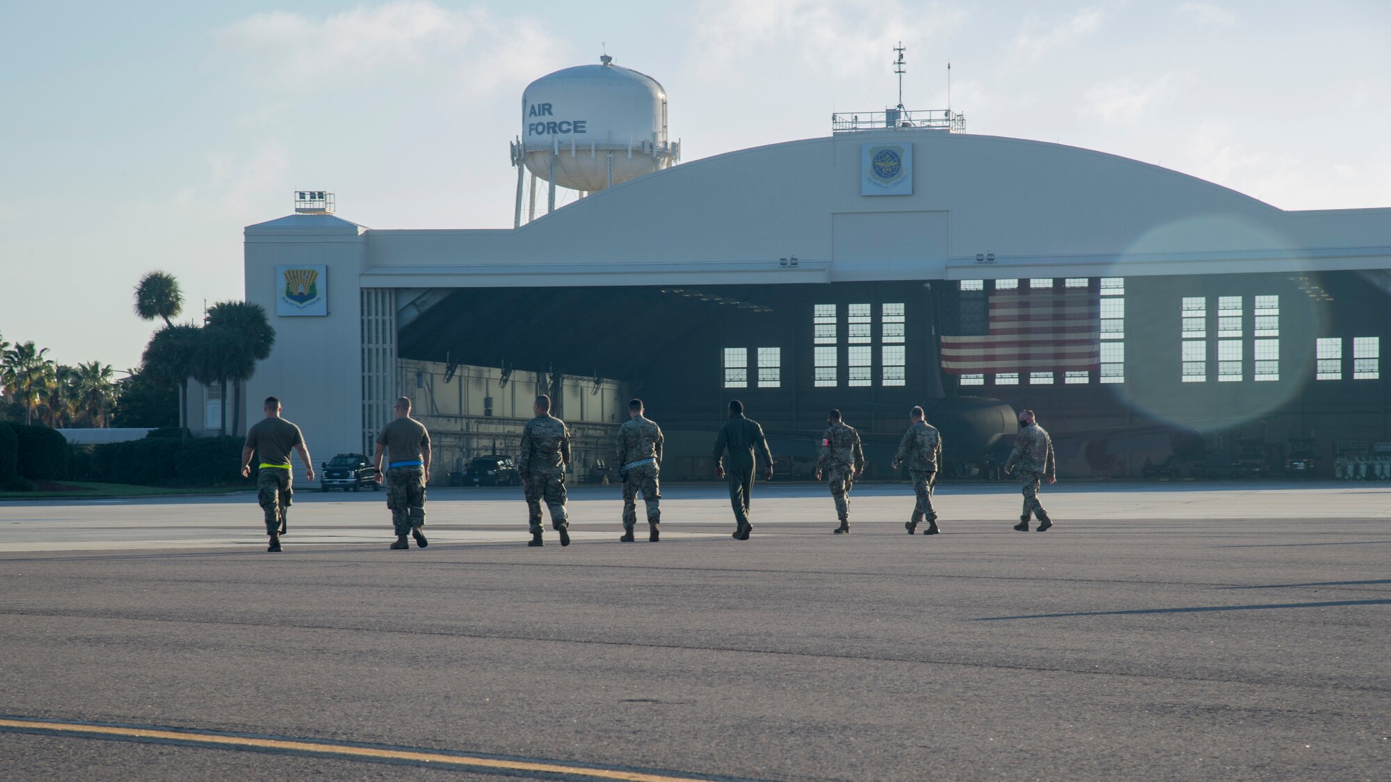 Team MacDill Airmen conduct a foreign object and debris walk on the flight line at MacDill Air Force Base, Fla., Nov. 13, 2020, following Tropical Storm Eta.