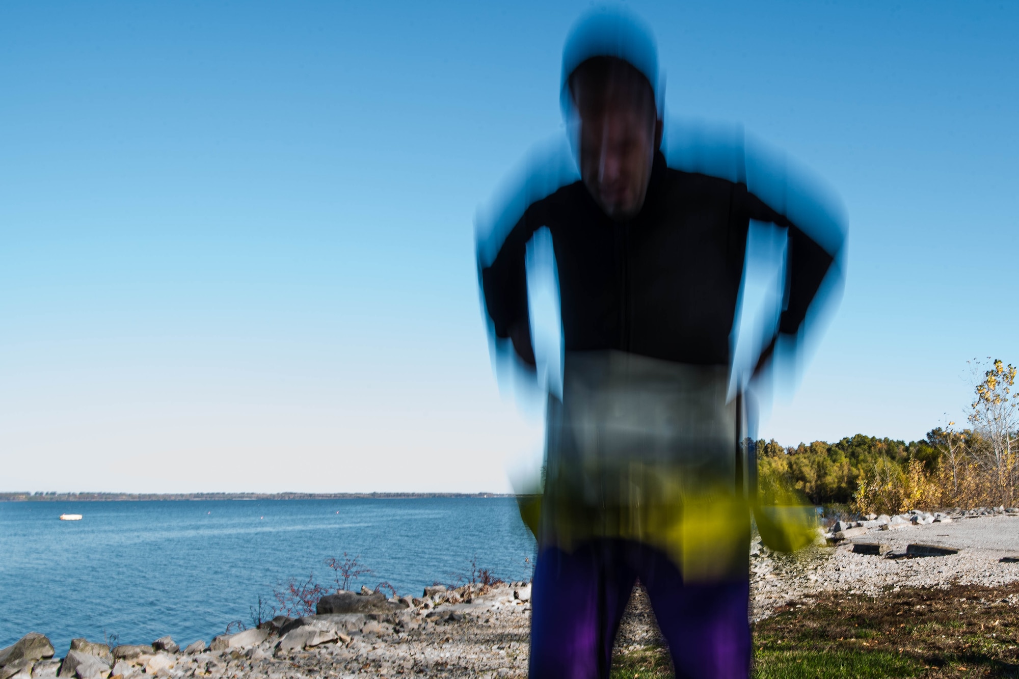 Person putting on water suit