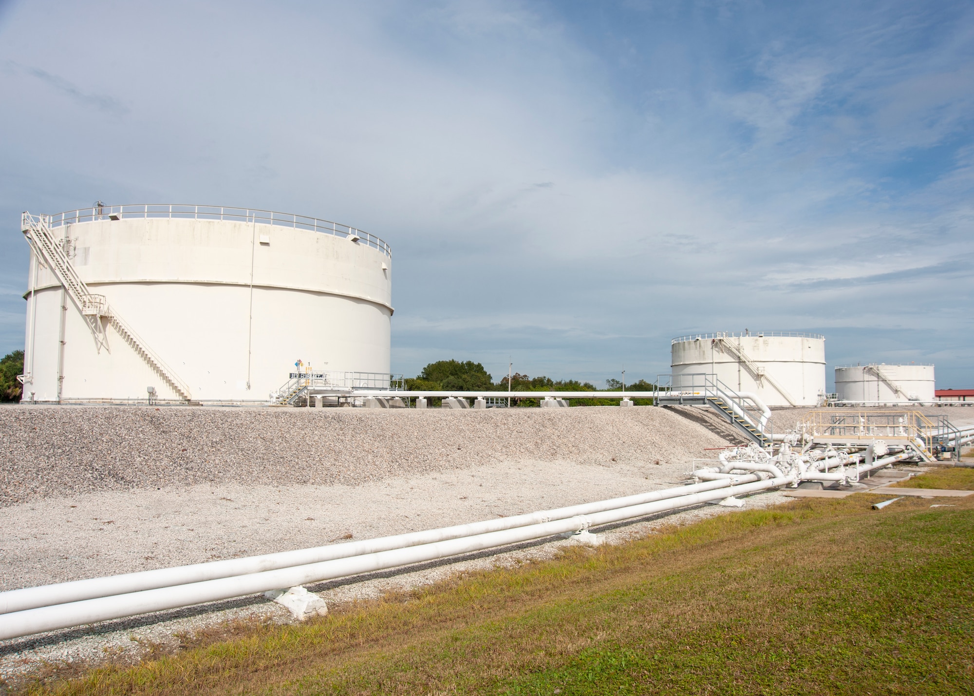 The defense fuel supply point is located on the far eastern side of MacDill Air Force Base, Fla. These tanks can store up to approximately 6,500,000 gallons of Jet Fuel A and the operators transfer around 350,000 gallons of fuel to use for KC-135 Stratotankers on MacDill AFB. (U.S. Air Force photo by Airman 1st Class David D. McLoney)
