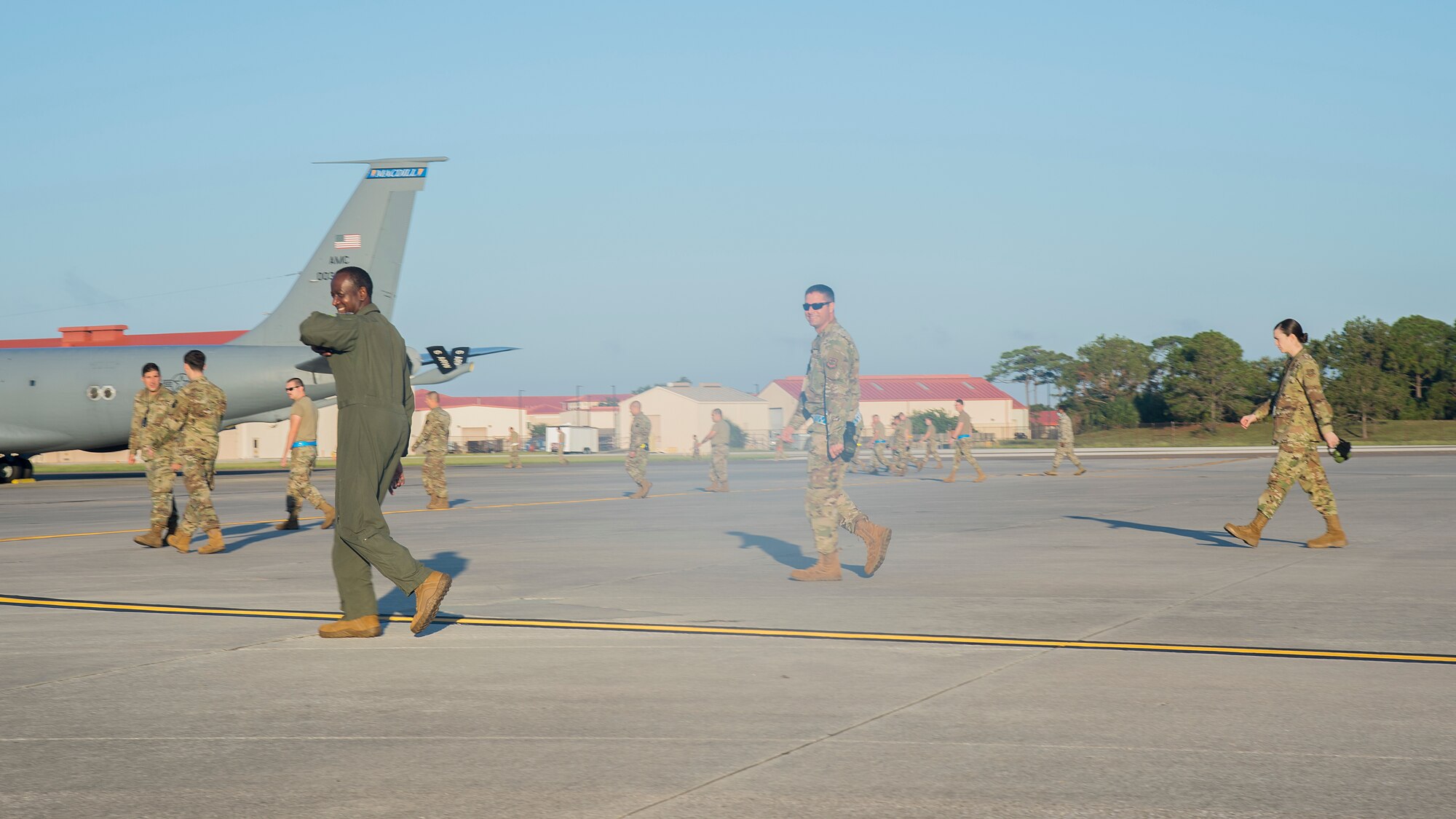 Team MacDill Airmen conduct a foreign object and debris (FOD) walk on the flight line at MacDill Air Force Base, Fla., Nov. 13, 2020, following Tropical Storm Eta.