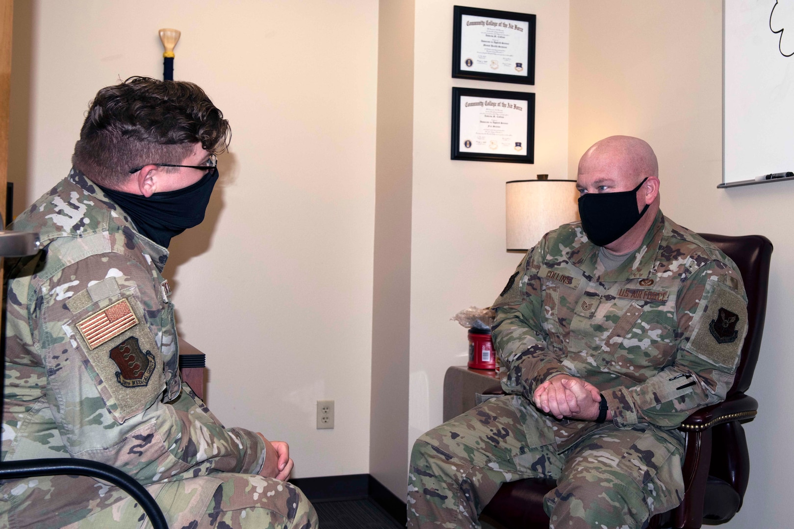 Military members talk at ellsworth