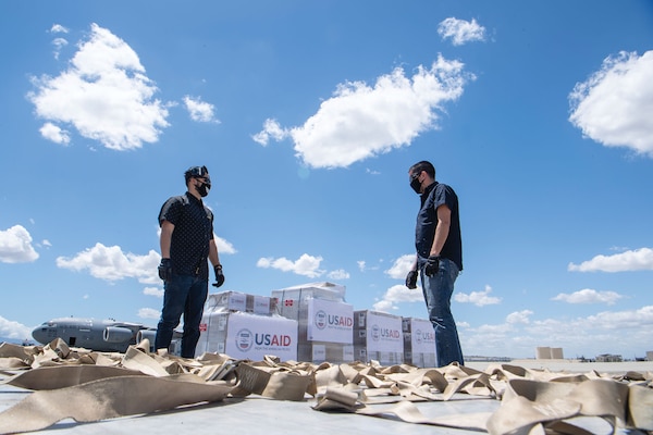 Transportation systems technicians from 452nd Logistic Readiness Squadron prepare 50 pallets of ventilators provided by U.S. Agency for International Development for delivery to Moscow, Russia, at March Air Reserve Base, California, May 19, 2020 (U.S. Air Force/Keith James)