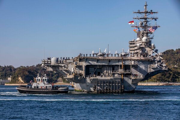 USS Ronald Reagan (CVN 76), returns to Yokosuka, Japan.