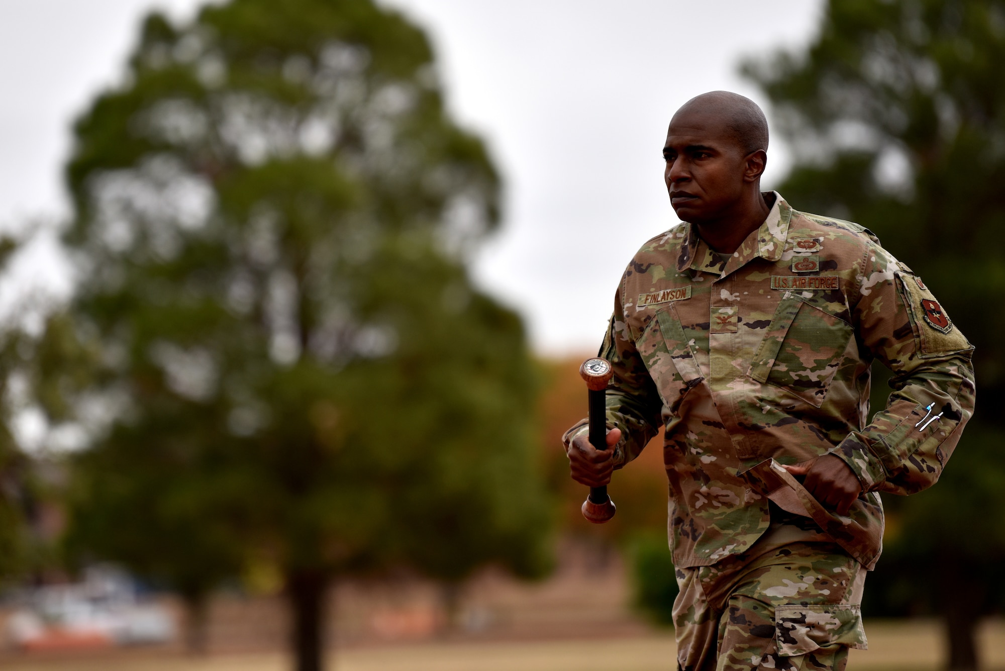 U.S. Air Force Col. James Finlayson, 17th Training Wing vice commander, runs the final stretch of the Mathis Fitness Center track during the Prisoner of War and Missing in Action 24 hour remembrance run on Goodfellow Air Force Base, Texas, Nov. 13, 2020. After each participant finished their running time they handed off the baton to the next member. (U.S. Air Force photo by Staff Sgt. Seraiah Wolf)