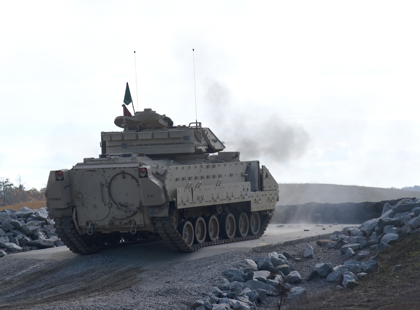 A Tennessee National Guard Bradley fighting vehicle sends rounds downrange during a re-opening ceremony for the Multi-Purpose Range Complex Nov. 6, 2020, at Maneuver Training Center Fort Pickett, Virginia.