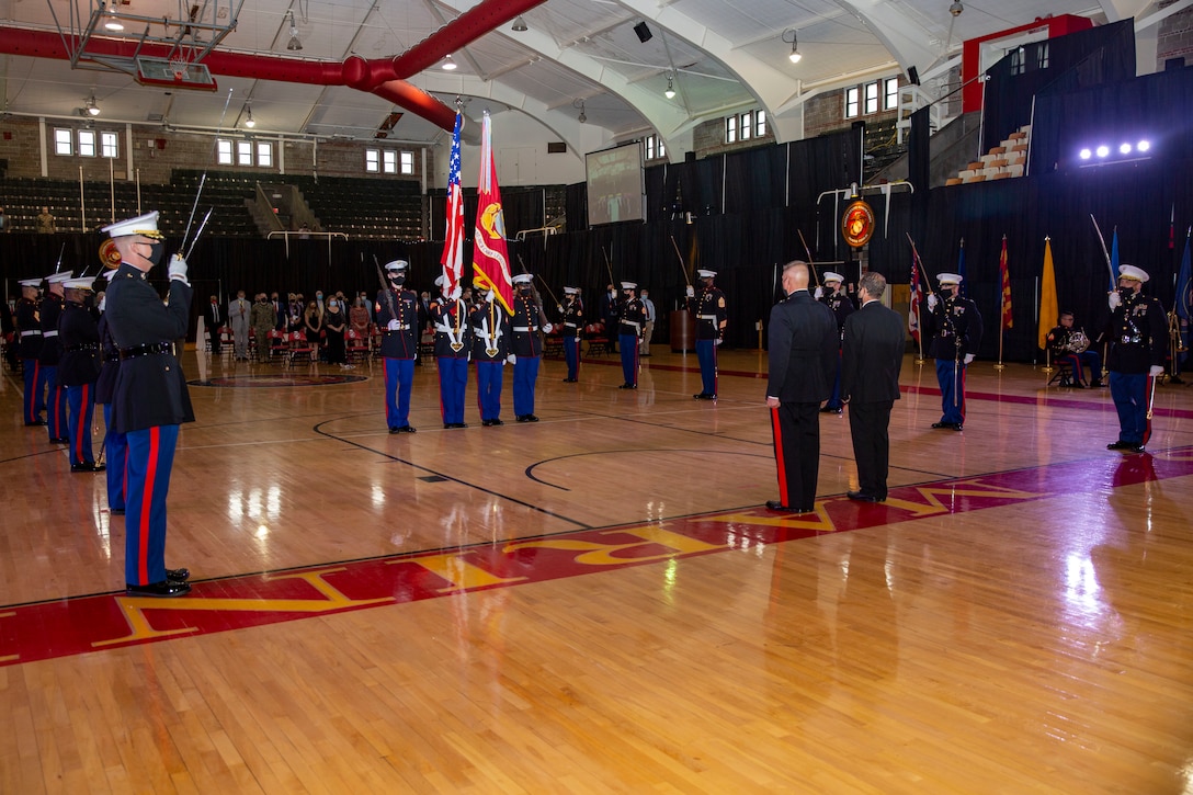 U.S. Marines present the colors during the Marine Corps Installations East-Marine Corps Base Camp Lejeune cake cutting ceremony at the Goettge Memorial Field House on MCB Camp Lejeune, North Carolina, Nov. 10, 2020. Marines with MCIEAST-MCB Camp Lejeune celebrated the 245th Marine Corps birthday by reading Gen. John A. Lejeune’s, 13th Commandant of the Marine Corps, birthday message and the cutting of the traditional birthday cake while adhering to COVID-19 mitigation protocols. (U.S. Marine Corps photo by Lance Cpl. Christian Ayers)