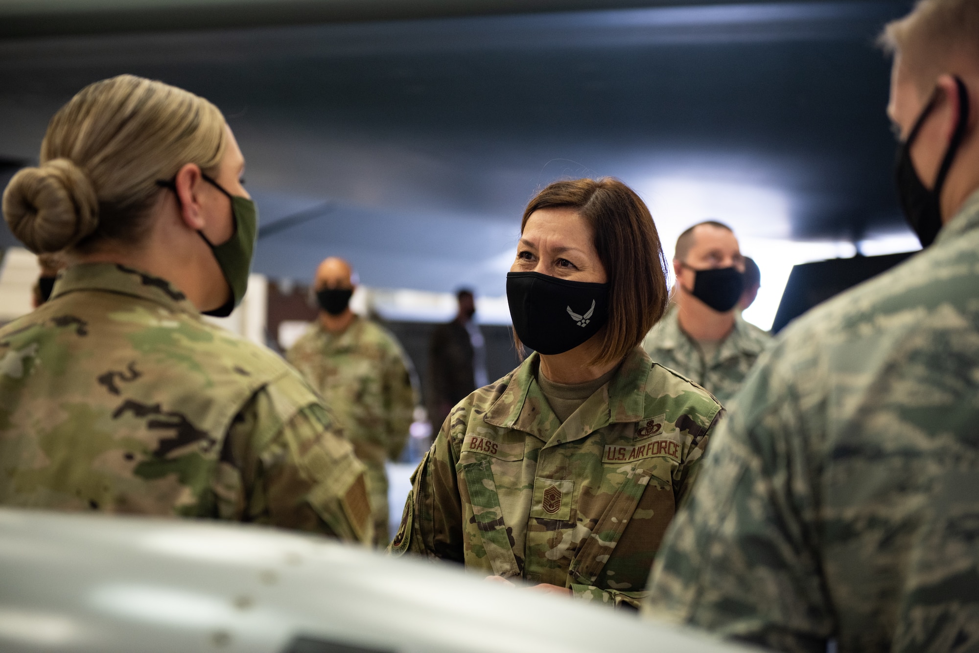 Chief Master Sergeant of the Air Force JoAnne S. Bass, speaks to maintenance Airmen during a B-2 Spirit stealth bomber tour at Whiteman Air Force Base, Missouri, Nov. 10, 2020. The 509th and 131st Maintenance groups provide full spectrum organizational and field-level maintenance and munitions support for the B-2 Spirit stealth bombers. (U.S. Air Force photo by Airman 1st Class Christina Carter)