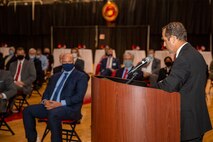 Michael Lazzara, right, Jacksonville Mayor pro tempore and the guest of honor, gives a speech during the Marine Corps Installations East-Marine Corps Base Camp Lejeune cake cutting ceremony at the Goettge Memorial Field House on MCB Camp Lejeune, North Carolina, Nov. 10, 2020. Marines with MCIEAST-MCB Camp Lejeune celebrated the 245th Marine Corps birthday by reading the birthday message from Gen. John A. Lejeune, 13th Commandant of the Marine Corps and cutting the traditional birthday cake while adhering to COVID-19 mitigation protocols. (U.S. Marine Corps photo by Lance Cpl. Christian Ayers)