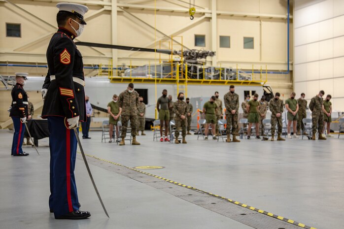 U.S. Marines with the Center for Naval Aviation Technical Training (CNATT) participate in the 245th Marine Corps birthday cake cutting ceremony on Marine Corps Air Station New River, North Carolina, Nov. 10, 2020. A celebration for the Marine Corps birthday is held every year to reflect on the traditions, history and legacy of the Marine Corps. Due to COVID-19, this year’s celebration was held with increased regulations and safety precautions. (U.S. Marine Corps Photo by Lance Cpl. Isaiah Gomez)
