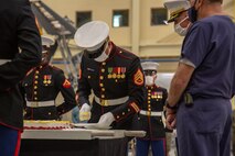 U.S. Marines with the Center for Naval Aviation Technical Training (CNATT) cut the cake at the 245th Marine Corps birthday cake cutting ceremony on Marine Corps Air Station New River, North Carolina, Nov. 10, 2020. A celebration for the Marine Corps birthday is held every year to reflect on the traditions, history and legacy of the Marine Corps. Due to COVID-19, this year’s celebration was held with increased regulations and safety precautions. (U.S. Marine Corps Photo by Lance Cpl. Isaiah Gomez)