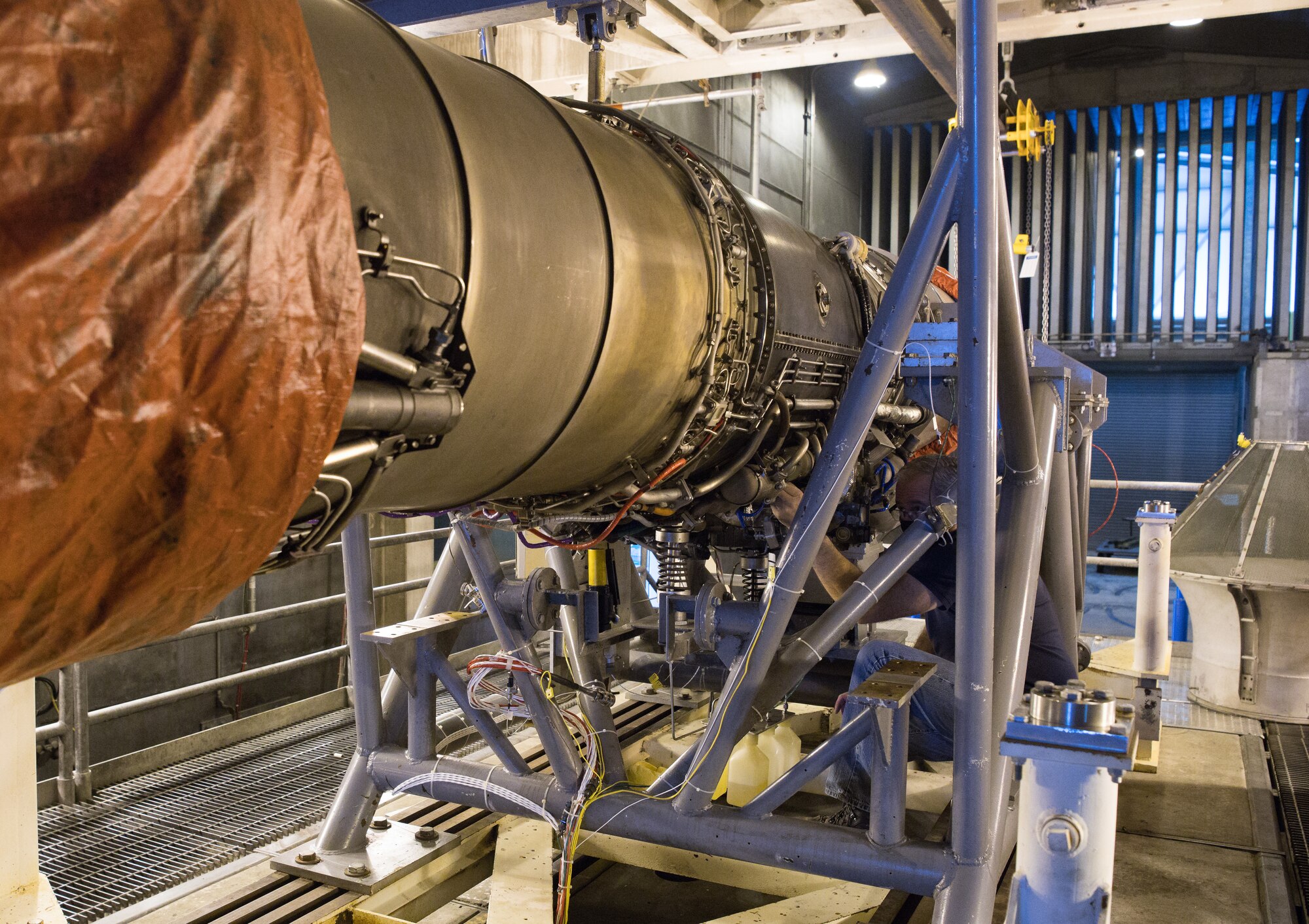 A F404 engine is prepared to run in the Sea Level 1 Test Cell at Arnold Air Force Base, Tenn., Sept. 1, 2020. The F404 will be operated to determine the health of the engine and if it is suitable for use as an engine sensors testbed. (U.S. Air Force photo by Jill Pickett)