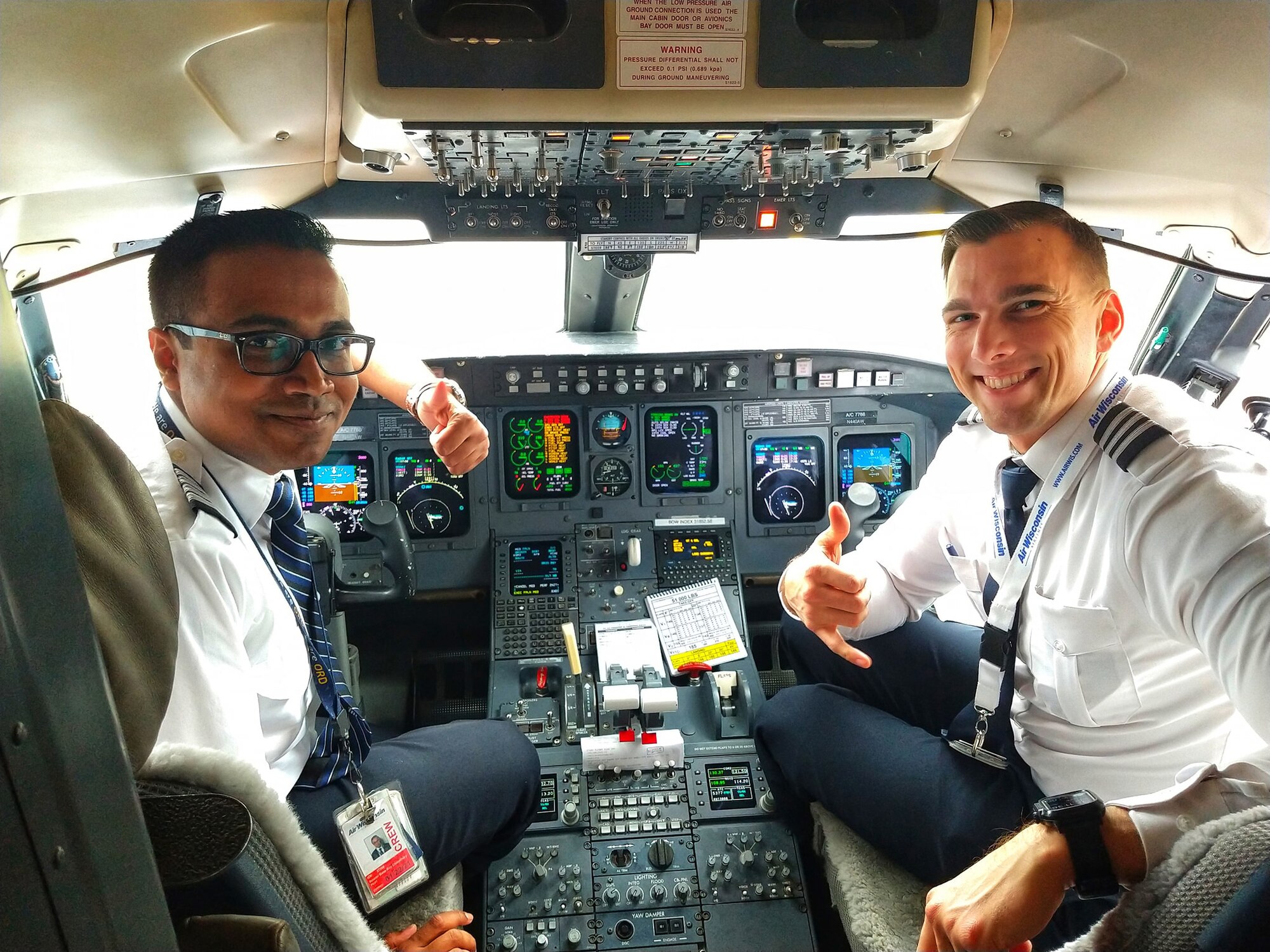 Airman 1st Class Sorav Basu Roy (left), an air transportation specialist assigned to the 482nd Fighter Wing, Homestead Air Reserve Base, Florida, and a commercial airline pilot with United Express, is living the American dream.