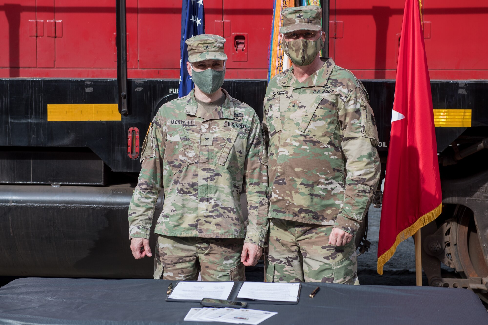 Soldiers signing memorandum of agreement at railway operations center