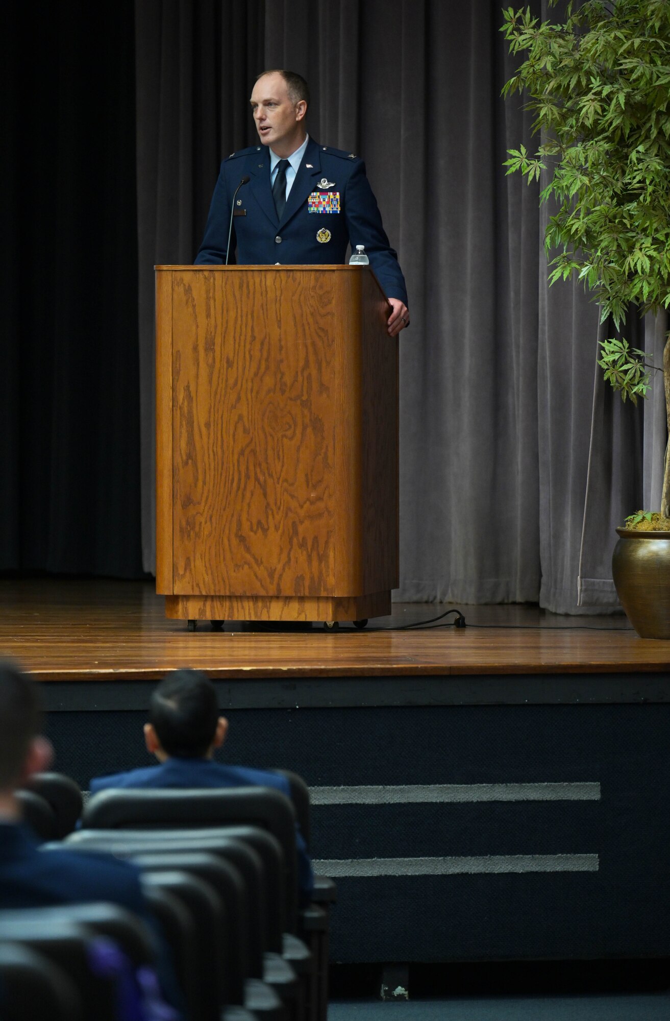 U.S. Air Force Col. Matthew Leard, 97th Air Mobility Wing commander, speaks to the Specialized Undergraduate Pilot Training class of 21-02 during their graduation ceremony Nov. 13, 2020, on Columbus Air Force Base, Miss. As commander, Leard is responsible for the formal training of all KC-46 Pegasus, C-17 Globemaster III and KC-135 Stratotanker aircrews for active duty, Air National Guard and Air Force Reserve units, as well as multiple partner air forces from across the world. (U.S. Air Force photo by Senior Airman Jake Jacobsen)