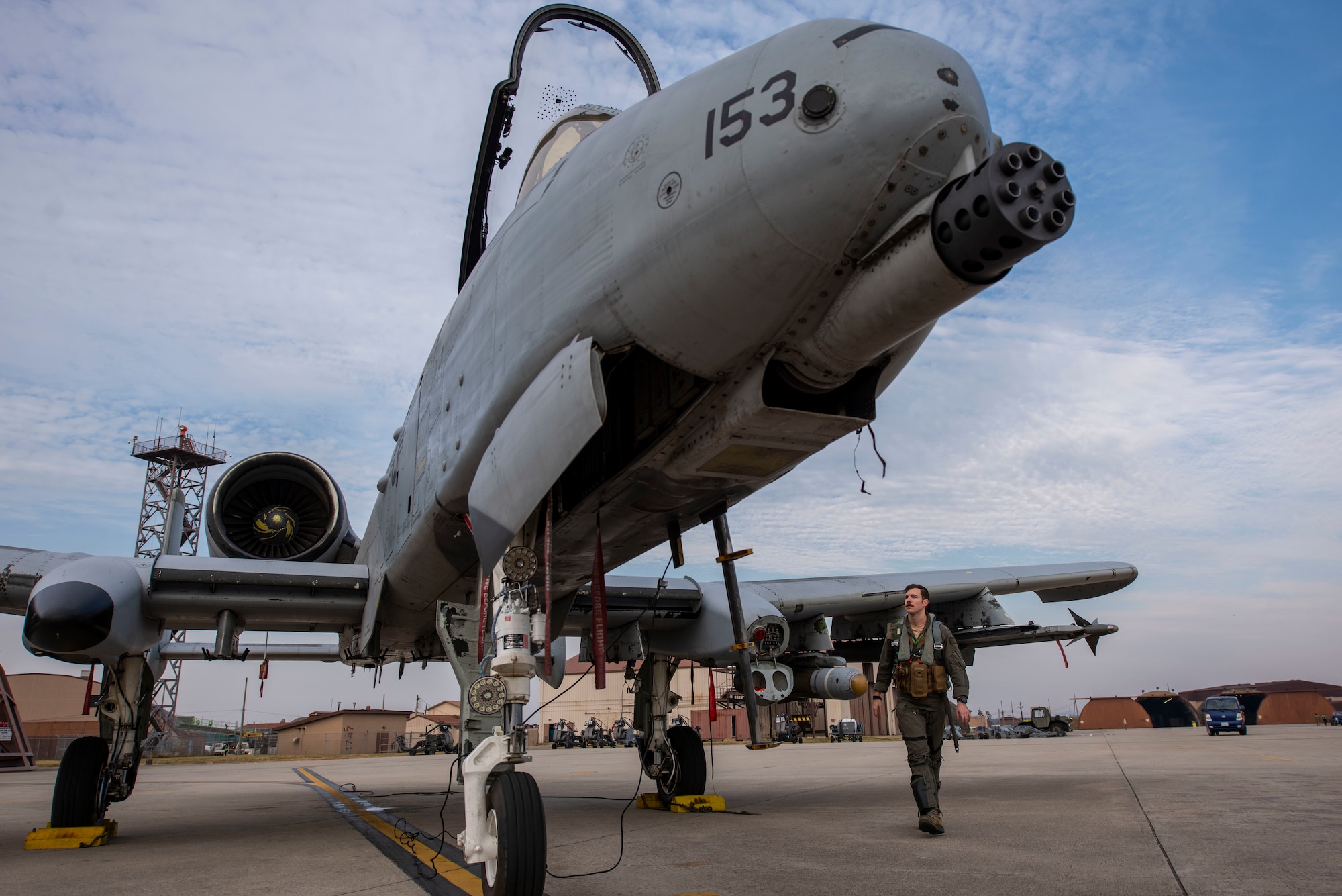 A pilot inspects an A-10