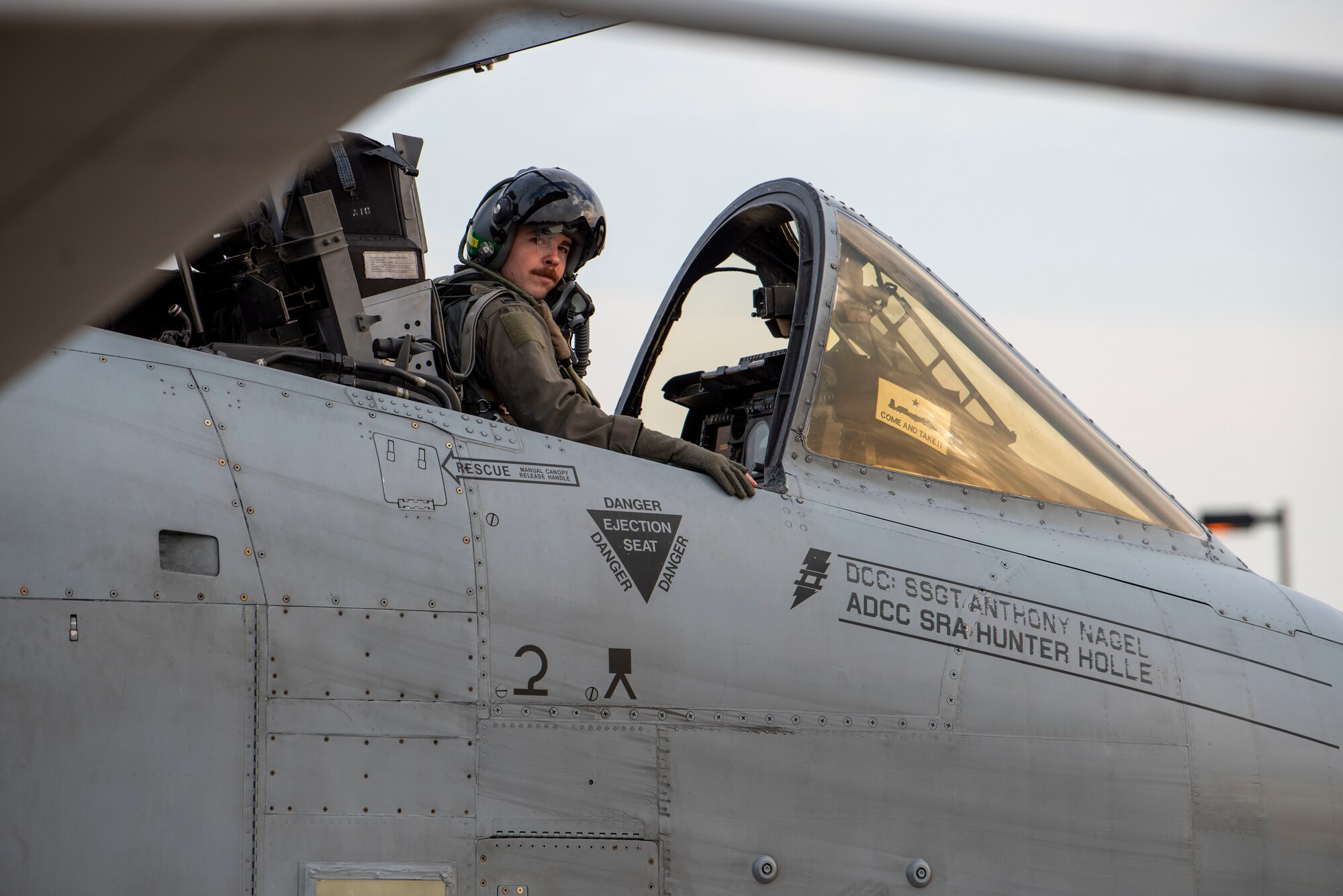 A pilot sits in an A-10