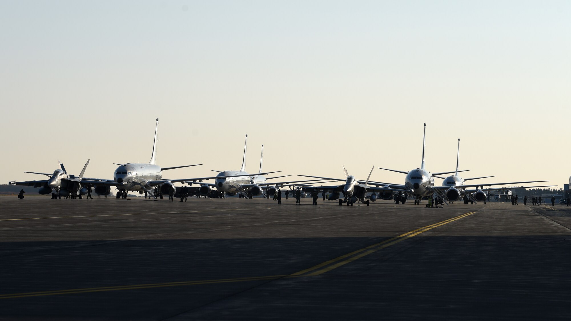 Personnel prepare F-16 Fighting Falcons and EA-18 Growlers for takeoff during a Bomber Task Force mission at Misawa Air Base, Japan, Nov. 13, 2020. Bomber Task Force missions demonstrate U.S. commitment to allies and partners throughout the Indo-Pacific area of responsibility and the ability of Air Force Global Strike Command to deliver lethal strike options for combatant commanders at a moment’s notice. (U.S. Air Force photo by Staff Sgt. Grace Nichols)