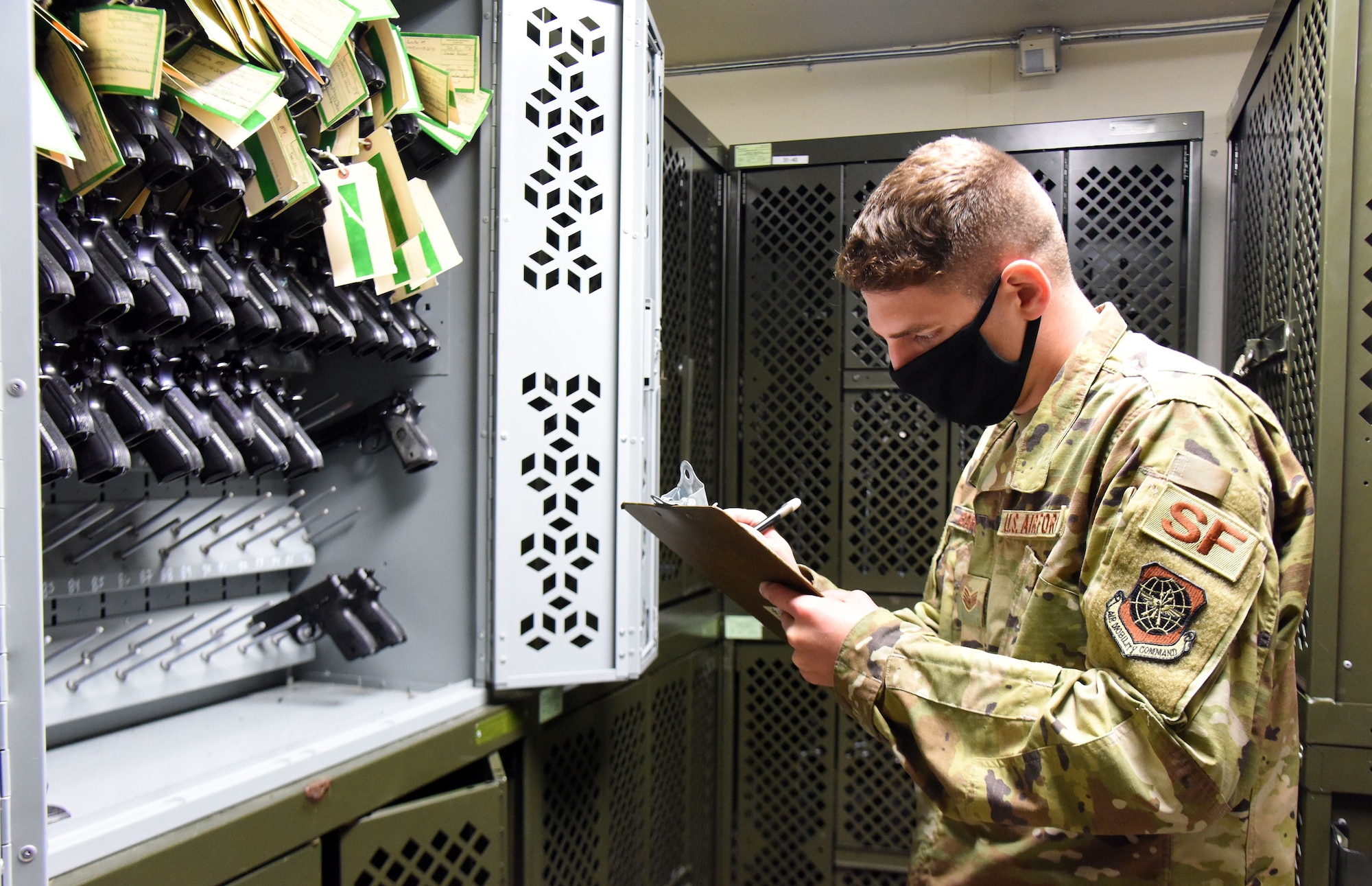 U.S. Air Force Staff Sgt. Andrew Barrows, 87th Security Forces Squadron combat arms instructor, performs inventory checks in the armory room, Nov. 6, 2020, on Joint Base McGuire-Dix-Lakehurst, N.J. Barrows performs inventory checks on a daily basis to ensure that all weapons and ammunition are accounted for, while maintaining smooth operations. (U.S. Air Force photo by Daniel Barney)