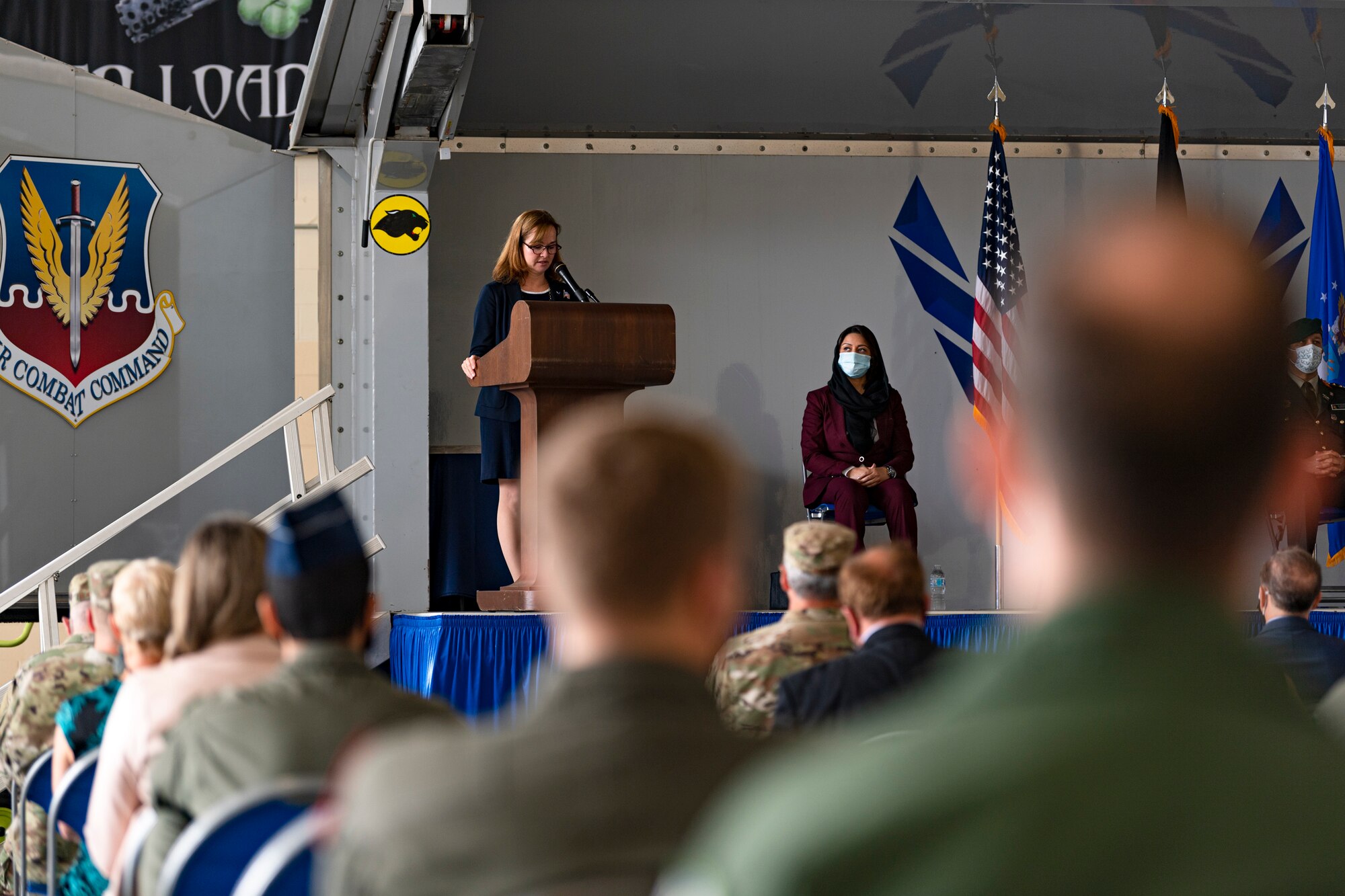 A photo of the deputy under secretary of the Air Force for international affairs speaking during a ceremony