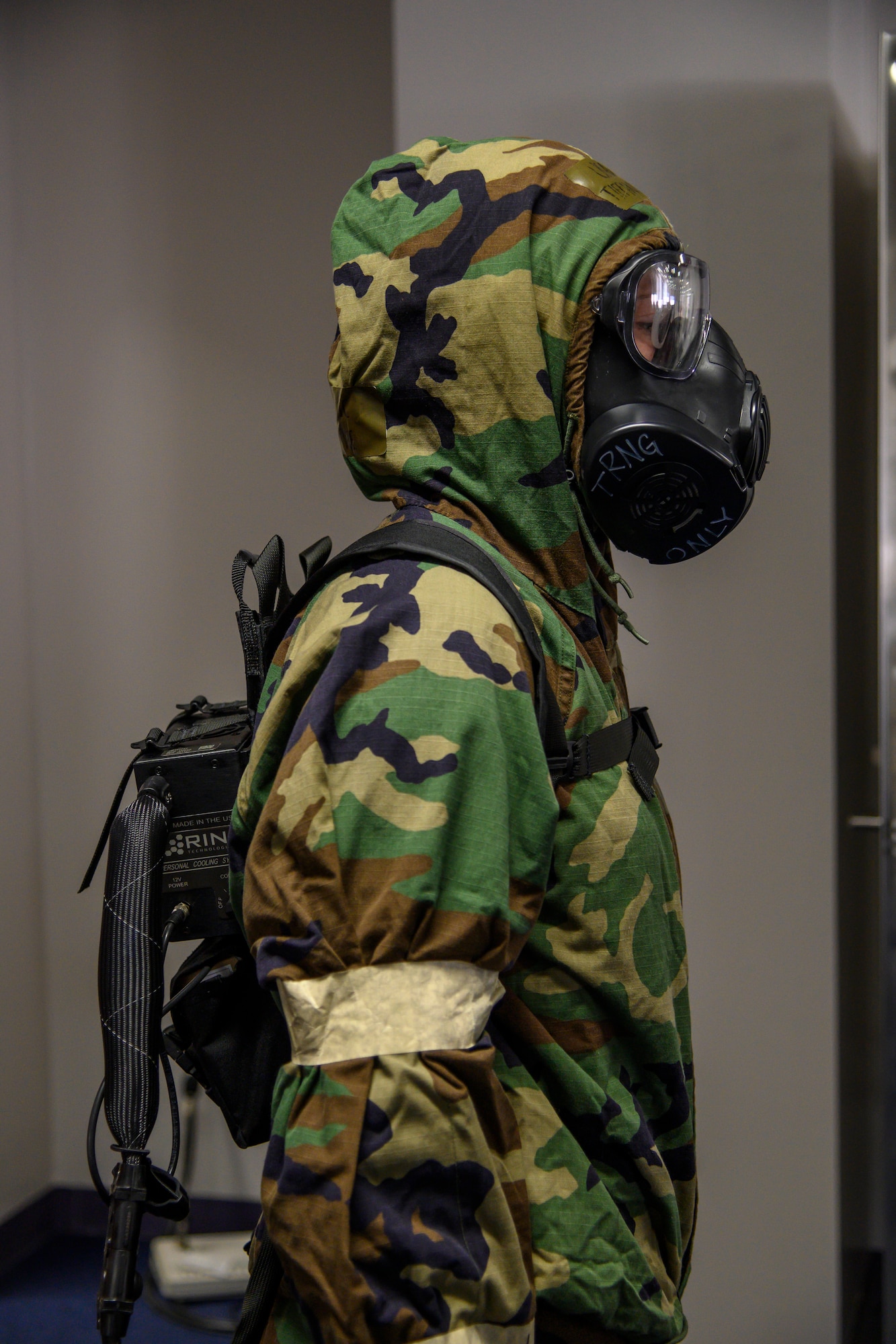 U.S. Air Force Airman 1st Class Tiffany Eustice, a 35th Civil Engineer Squadron emergency manager, wears her mission oriented protective posture gear and cooling vest at Misawa Air Base, Japan, Nov. 12, 2020. Twenty-four cooling vests were purchased as a result of Pitch Day. Maintenance, security forces, the fire department and the EOD flight each received four vests to test during exercises and training events. (U.S. Air Force photo by Airman 1st Class China M. Shock)