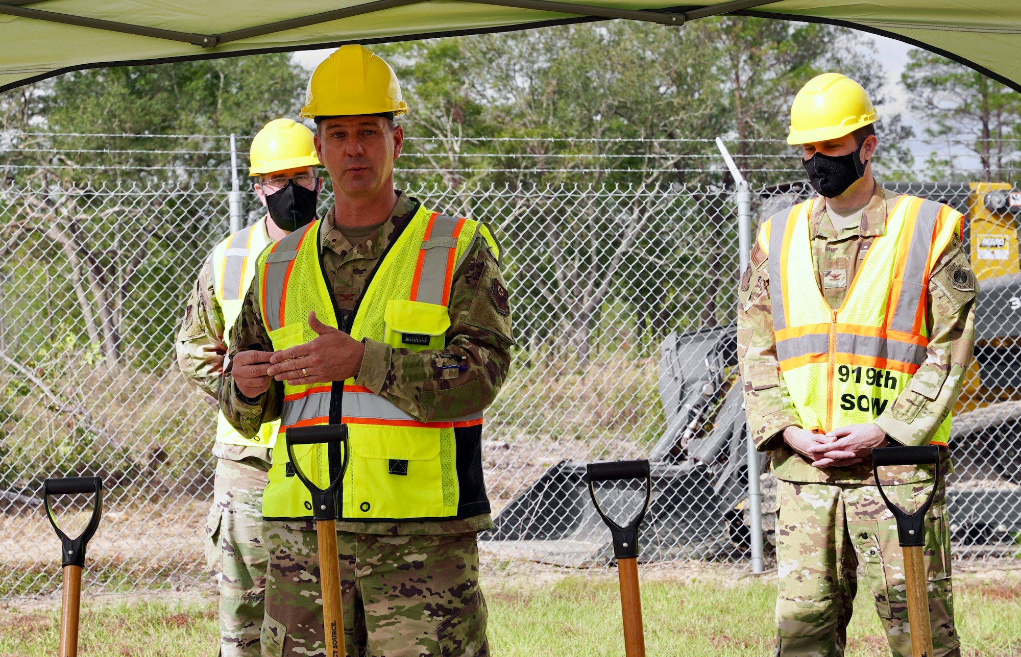 Photo of 492 SOW commander speaking during a ground breaking ceremony