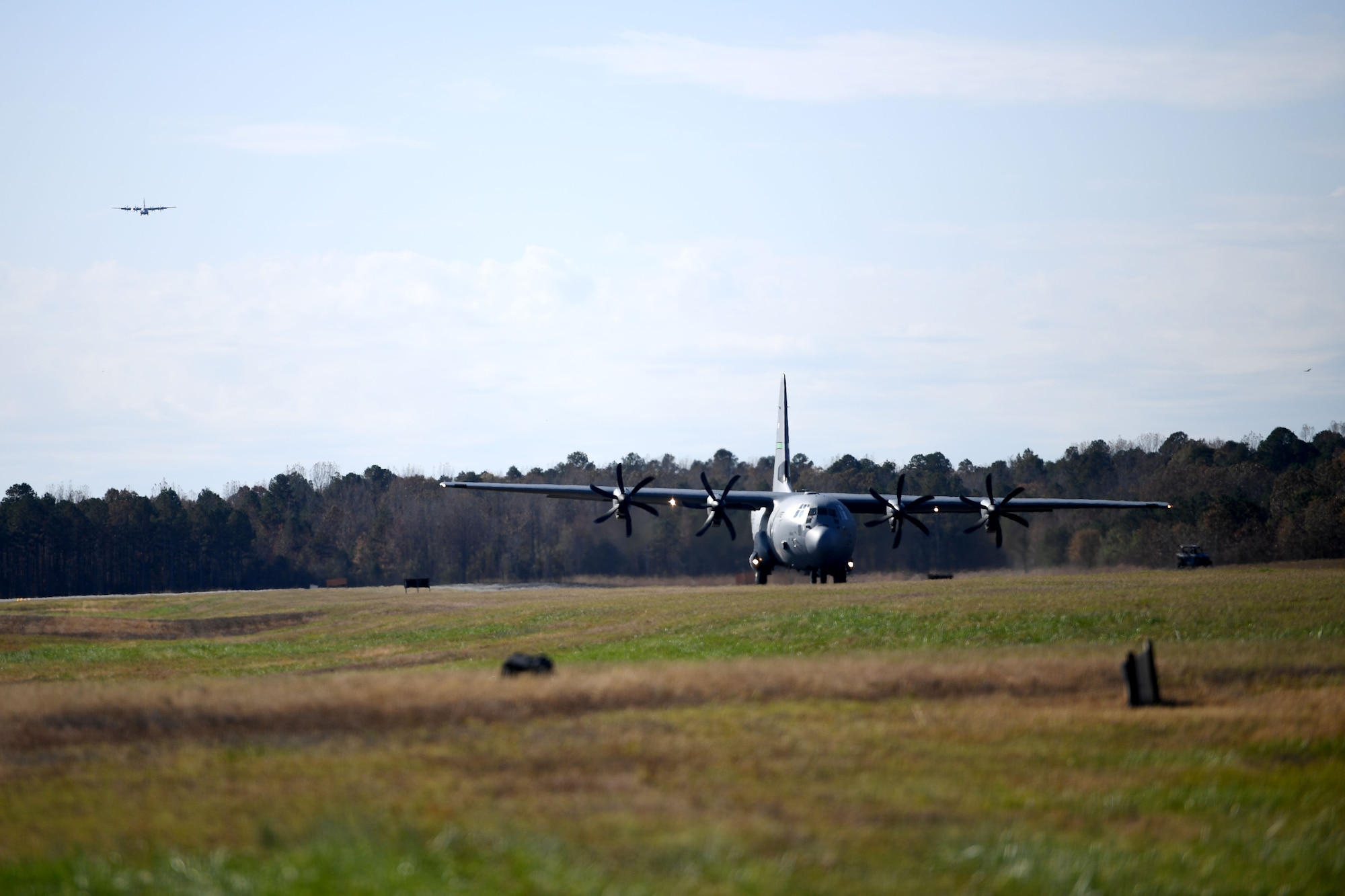 A C-130J lands on makeshift runway