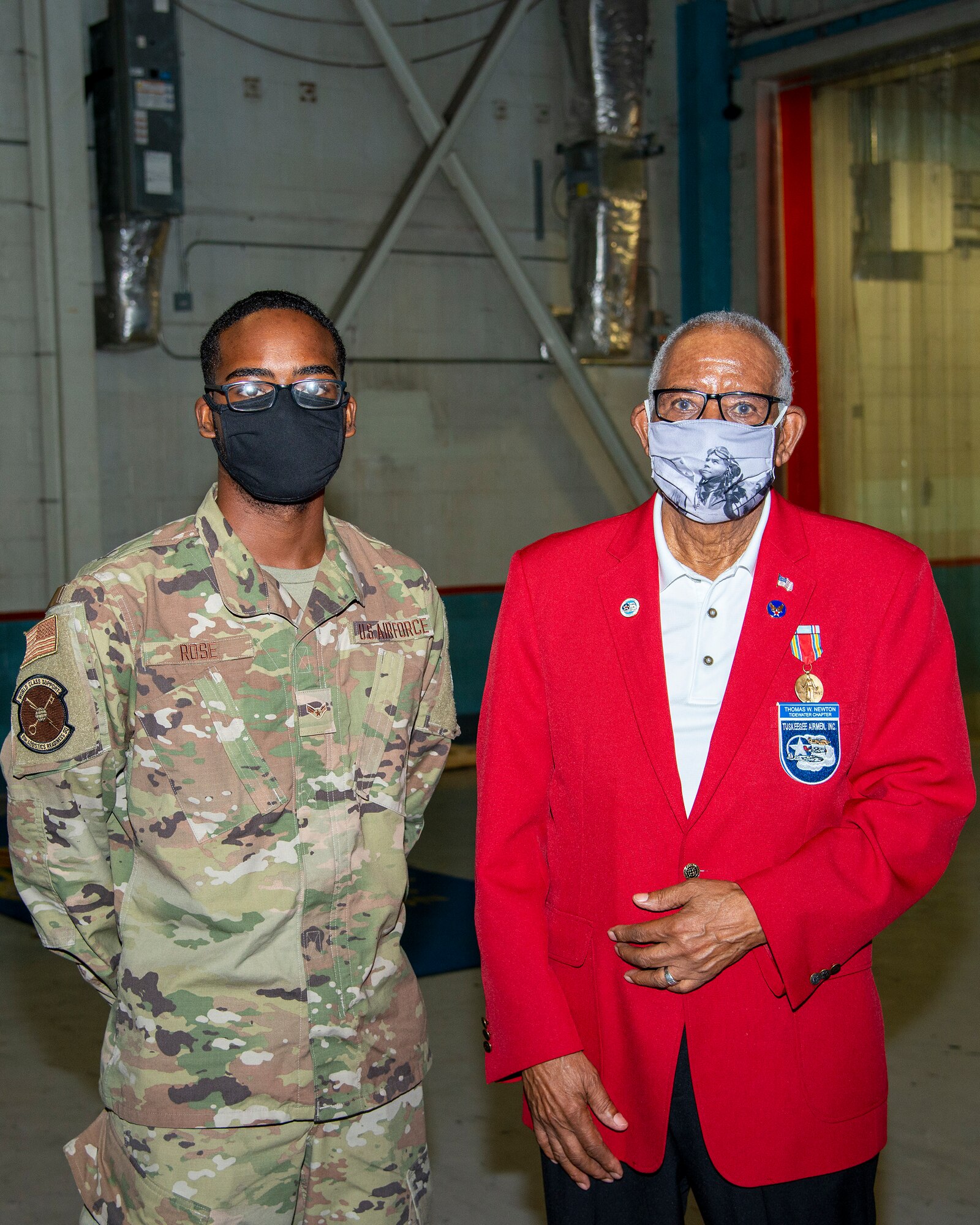 U.S. Air Force Airman 1st Class Duron Rose, a 6th Logistics Readiness Squadron fuels distribution apprentice, pauses for a photo with U.S. Army Air Forces Sgt. Thomas Newton, a Documented Original Tuskegee Airman, at MacDill Air Force Base, Fla., Nov. 10, 2020.