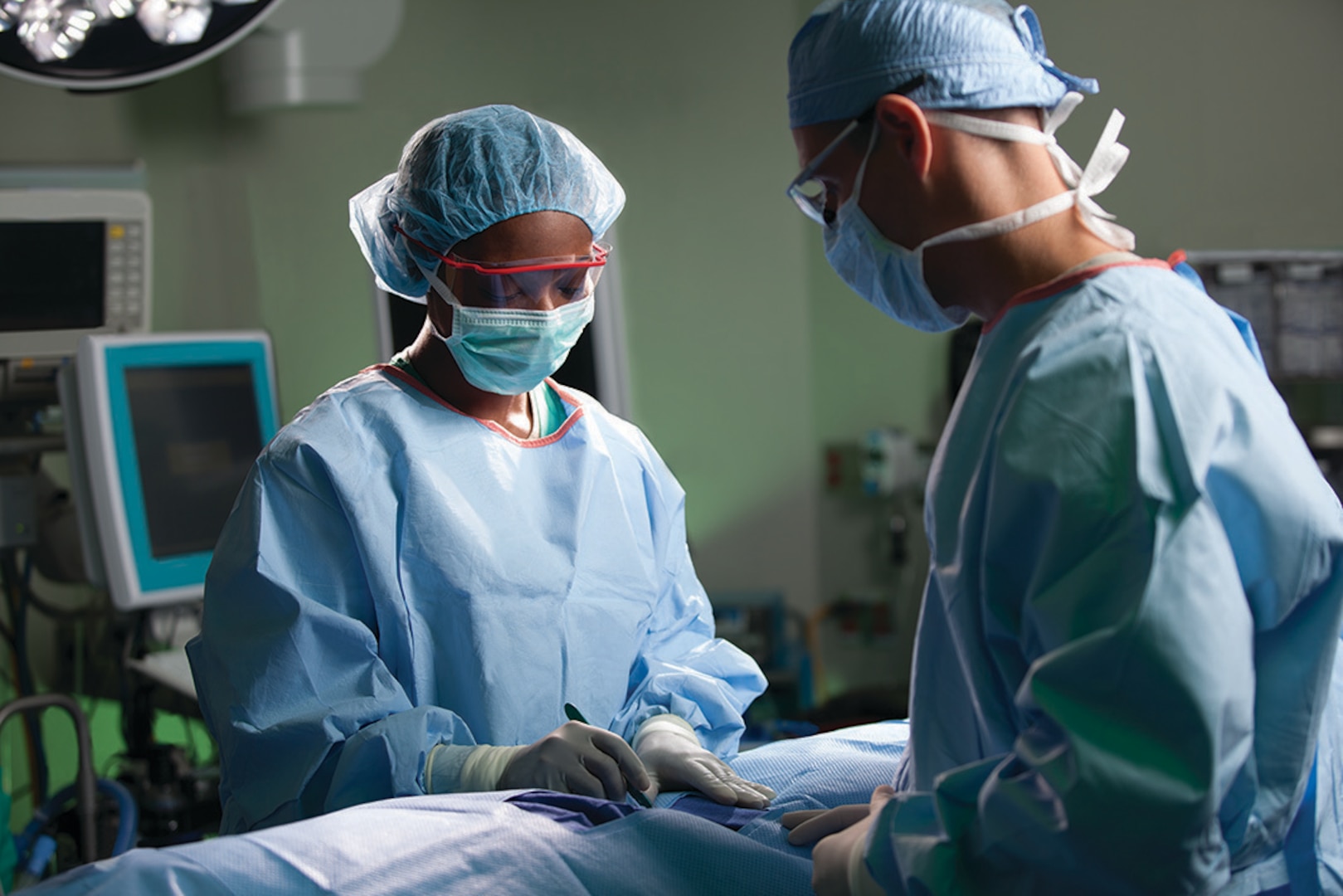 Surgeons perform a procedure at Brooke Army Medical Center, Joint Base San Antonio-Fort Sam Houston, Texas.