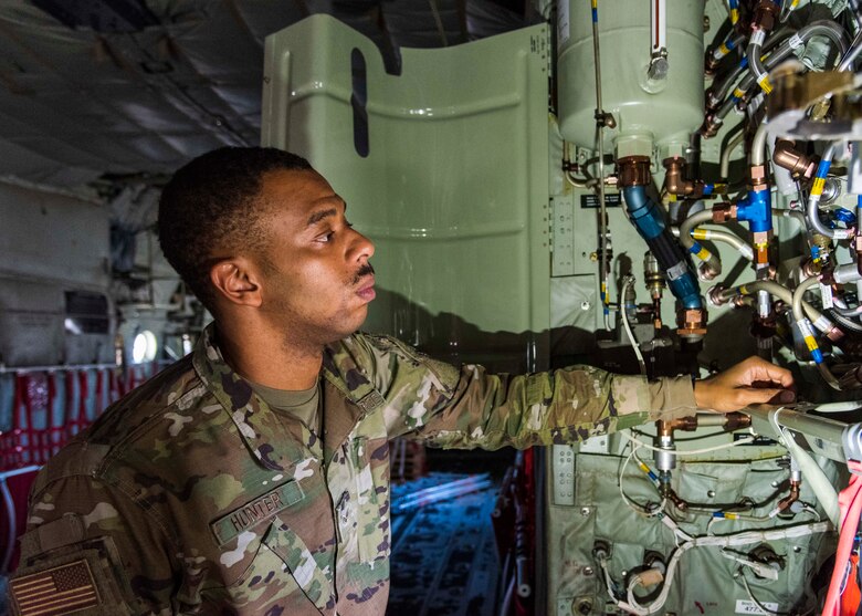 Air Force Reserve Senior Amn Edward Hunter, 913th Maintenance crew chief, inspects the hydraulic system of the C-130J Super Hercules at Little Rock Air Force Base, Ark, Nov. 4, 2020. Most recently, Hunter volunteered to help the Hurricane Hunters based out of Kessler AFB, Mississippi, to ensure that the aircraft were ready to fly at a moment’s notice carry out the numerous National Oceanic and Atmospheric Administration missions this season.