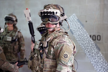 Soldiers don the Capability Set 3 (CS3) militarized form factor prototype of the Army’s Integrated Visual Augmentation System (IVAS) and wield a Squad immersive Virtual Trainer (SiVT) during a training environment test event at its third Soldier Touchpoint (STP 3) at Fort Pickett, Virginia.