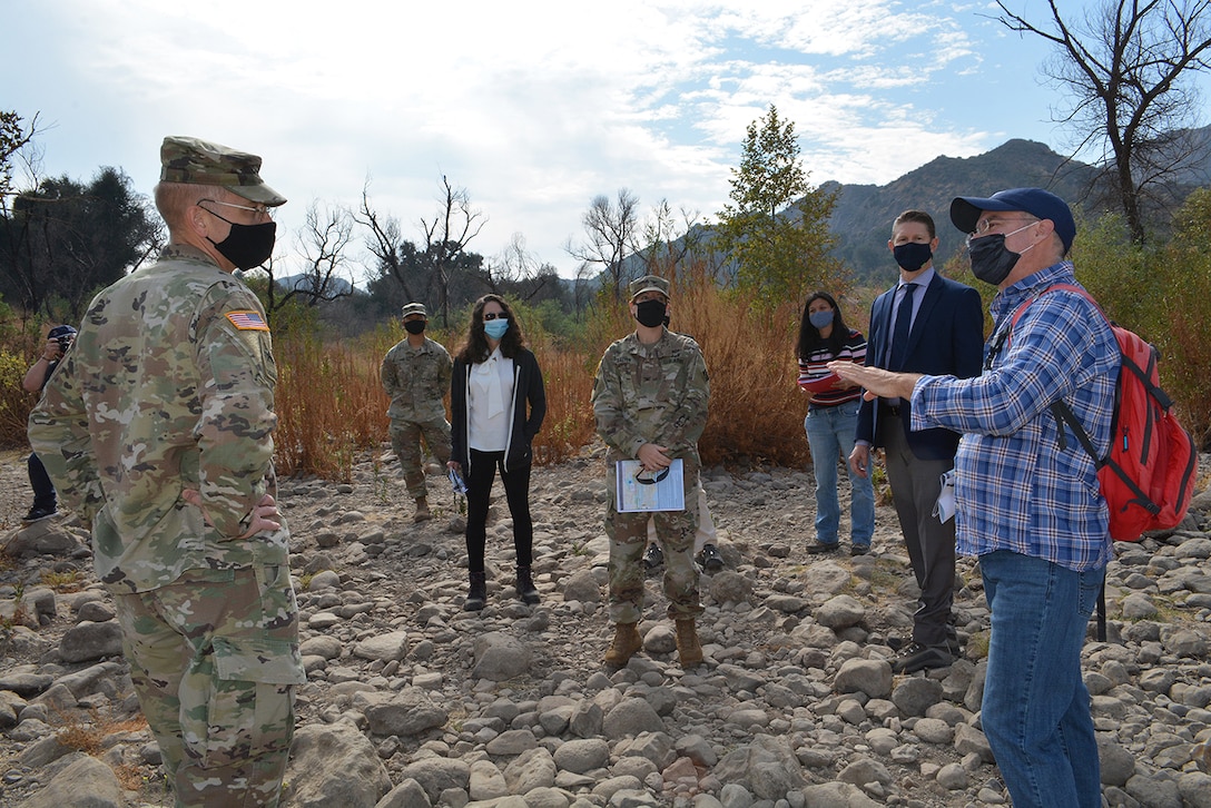 Jim Hutchison, U.S. Army Corps of Engineers Los Angeles District lead planner for the Malibu Ecosystem Restoration Project, right, discusses plans for the project with Maj. Gen. William “Butch” Graham, deputy commanding general for civil and emergency operations, U.S. Army Corps of Engineers Headquarters, left, during an Oct. 6 site tour of the project near Calabasas, California. Lt. Gen. Scott Spellmon, the Corps’ commanding general and 55th U.S. Army chief of engineers, signed the chief’s report for the project Nov. 13 at the Corps’ headquarters in Washington D.C., which now elevates the report to the Assistant Secretary of the Army for Civil Works, U.S. Office of Management and Budget, and to Congress for consideration of project authorization.