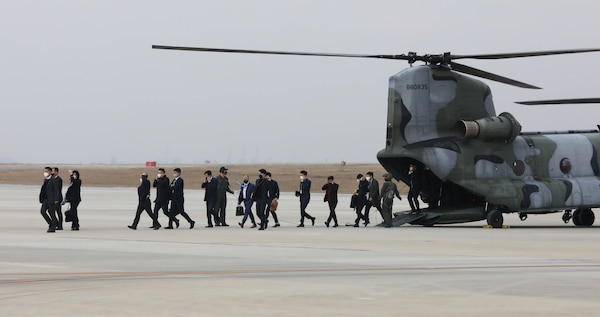 Several members of South Korea's National Assembly Defense Committee arrive at USAG Humphreys.