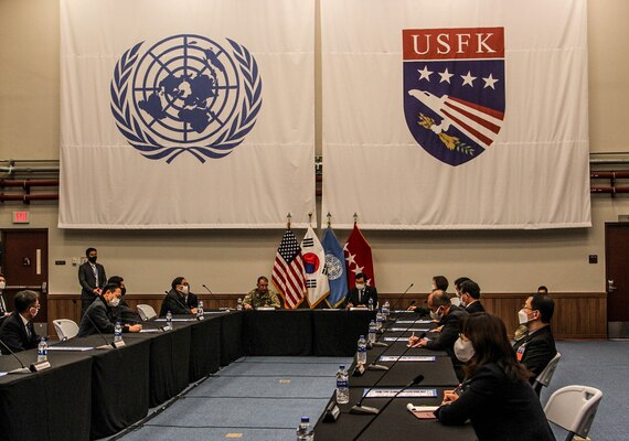 Gen. Robert B. "Abe" Abrams with several members of South Korea's National Assembly Defense Committee converse during roundtable discussions.