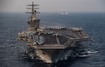 NORTH ARABIAN SEA (Nov. 17, 2020) The aircraft carrier USS Nimitz (CVN 68) steams ahead of the guided-missile cruiser USS Princeton (CG 59) while participating in Malabar 2020 in the North Arabian Sea. Malabar 2020 is the latest in a continuing series of exercises that has grown in scope and complexity over the years to address the variety of shared threats to maritime security in the Indo-Asia Pacific where the U.S. Navy has patrolled for more than 70 years promoting regional peace and security. Nimitz Carrier Strike Group is currently deployed to the 7th Fleet area of operations in support of a free and open Indo-Pacific.