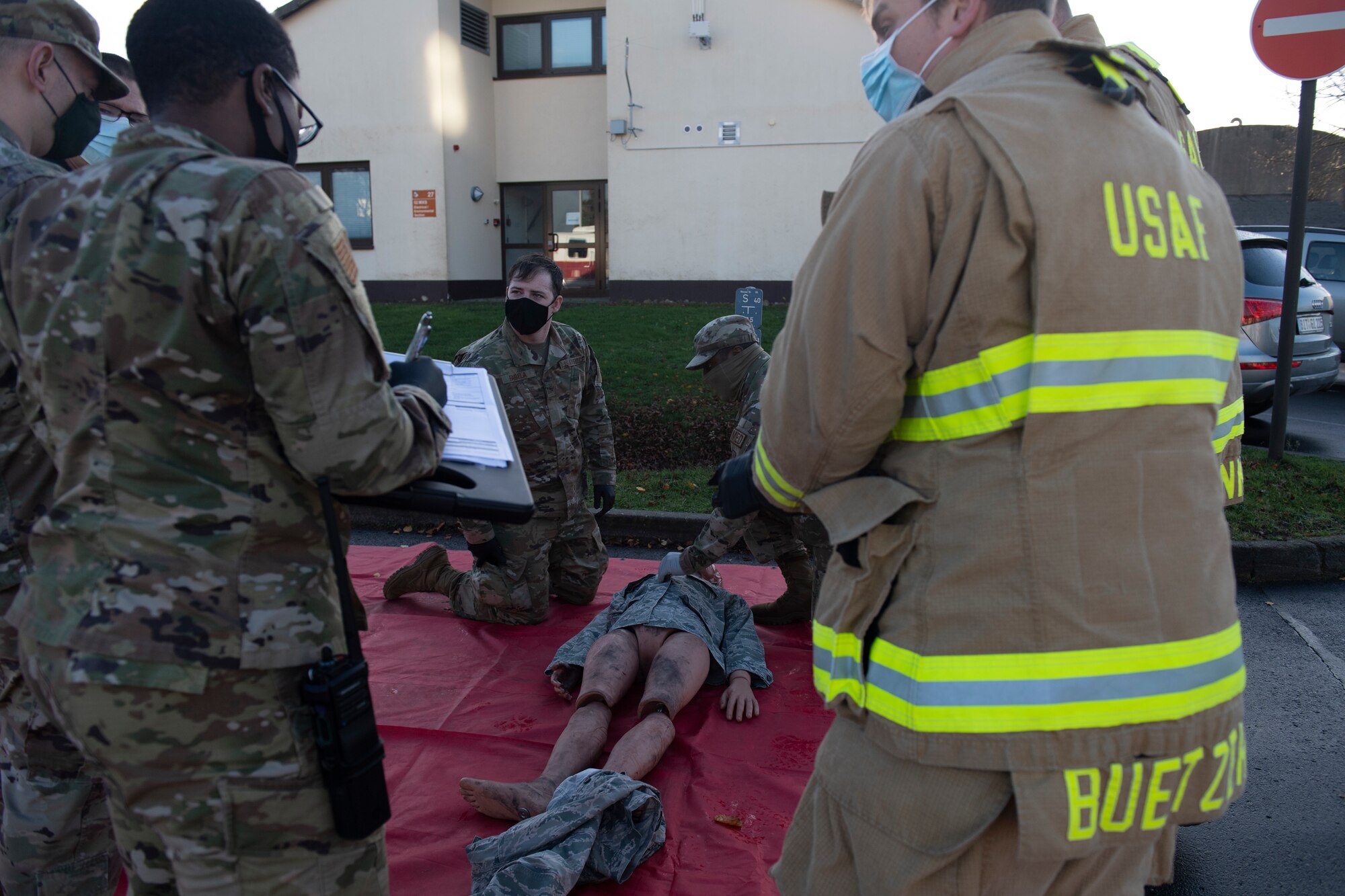 U.S. Air Force Airmen respond to a casualty during an active shooter exercise at Spangdahlem Air Base, Germany, Nov. 16, 2020. The exercise tested the ability of different base agencies' response times during an emergency situation, and allowed for evaluations to be performed by Wing Inspection Teams. (U.S. Air Force photo by Senior Airman Ali Stewart)