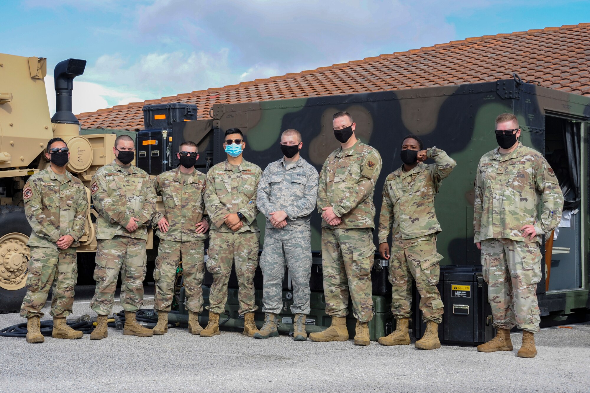 Airmen from the 729th Air Control Squadron pose for a photo at Patrick Air Force Base, Fla., Nov. 16, 2020. The 729th ACS provided air tracking support for the Falcon 9 Crew-1 launch on Nov. 15, 2020. (U.S. Space Force Photo by 2nd Lt. Christian Little)