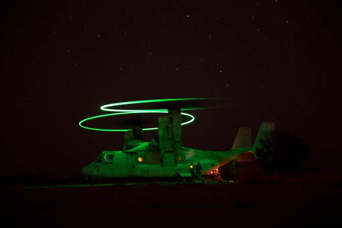 A U.S. Marine Corps MV-22B Osprey participating in Weapons and Tactics Instructor course 1-21, refuels during a static forward arming and refueling point training exercise while utilizing the tactical aviation ground refueling system, at Holtville Airfield, Holtville, Calif., Oct. 5.