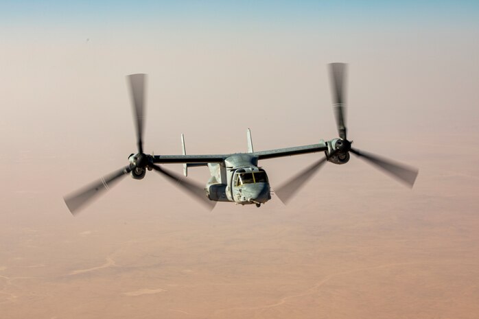 A U.S. Marine Corps MV-22 Osprey approaches a U.S. Marine Corps KC-130 for fuel during air-to-air refueling mission over the U.S. Central Command Area of Responsibility on Oct. 3.