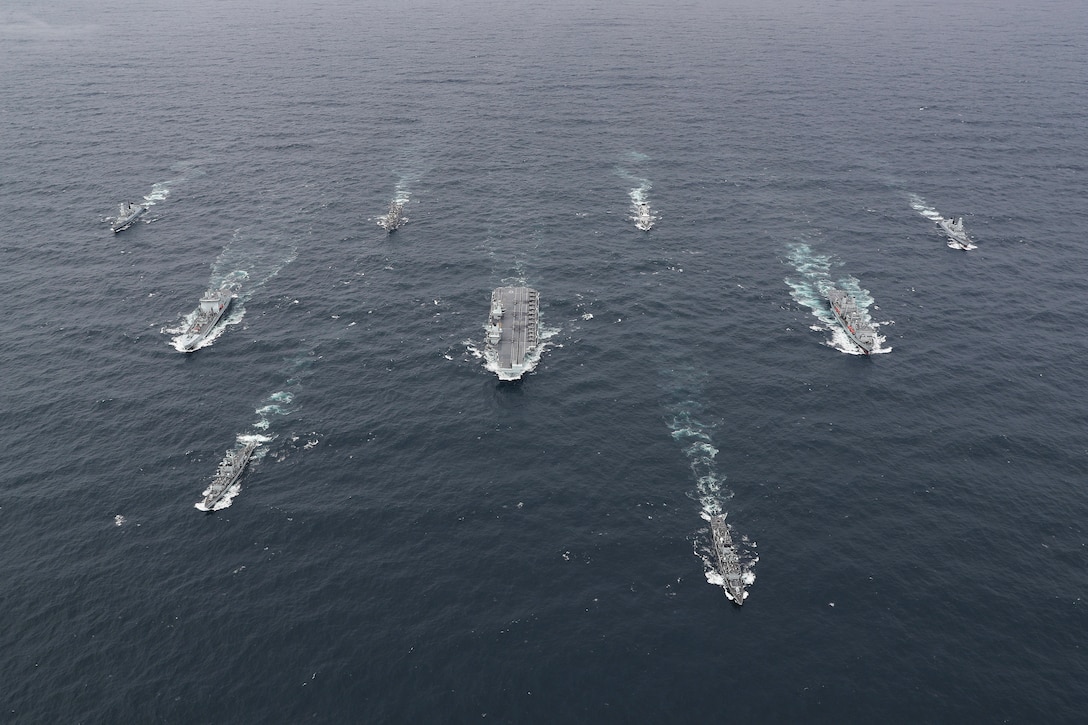 The full United Kingdom Carrier Strike Group assembled at sea on Oct. 4.