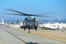 A photo of a helicopter taking off.