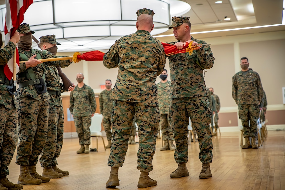 Col. Vincent Dawson and Sgt. Maj. Mark Murphy case the unit colors during the SPMAGTF-SC closing ceremony in Camp Lejeune, N.C., Nov. 13.