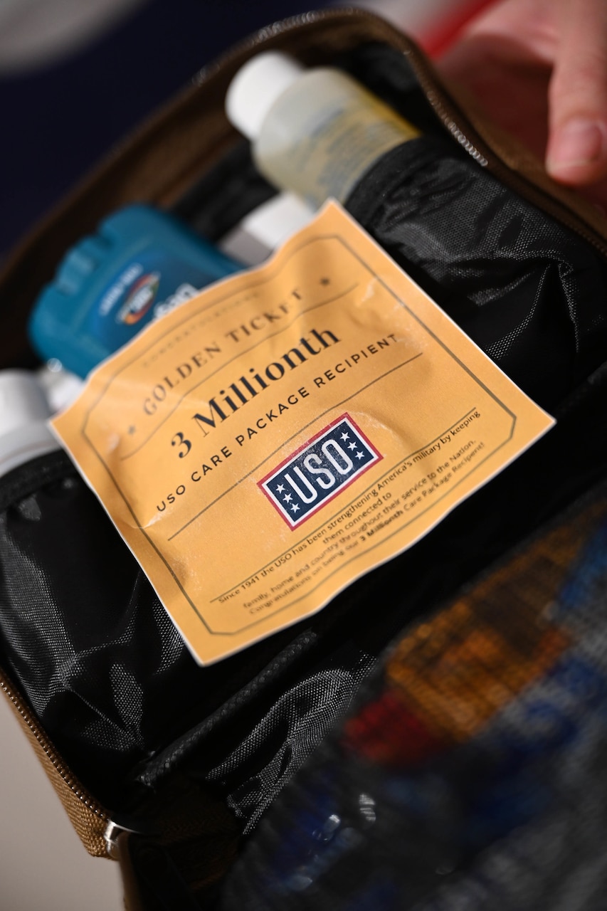 A package is labeled as the three-millionth care package.