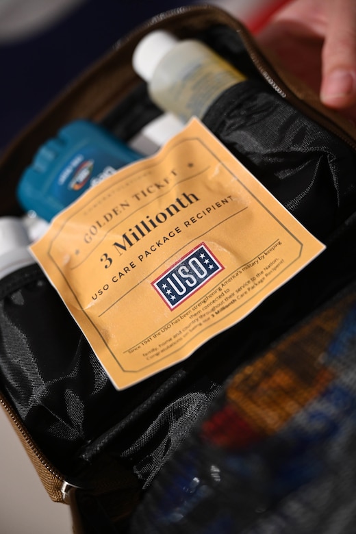 A package is labeled as the three-millionth care package.