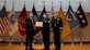 Image of Deputy Secretary of Defense David L. Norquist, left, and U.S. Army Lt. Gen. Ronald J. Place, right, and U.S. Air Force Tech. Sgt. Christina Swope